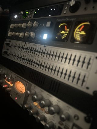 Rack gear equipment featuring Avalon preamps and UA hardware used for professional mixing services